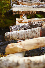 Image showing Wooden bridge over stream