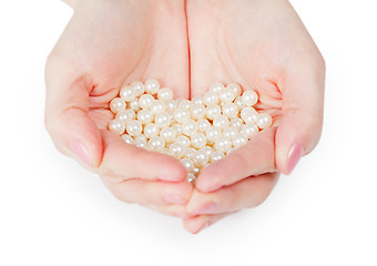 Image showing Handful of pearls on white background