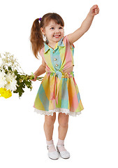 Image showing Cheerful child with bouquet of flowers