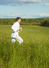 Image showing Young man is engaged in run