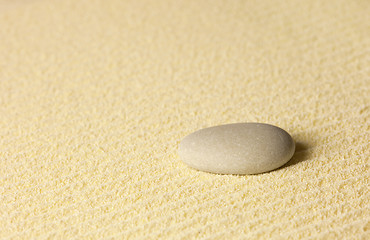 Image showing Element of Japanese rock-garden - stone on sand