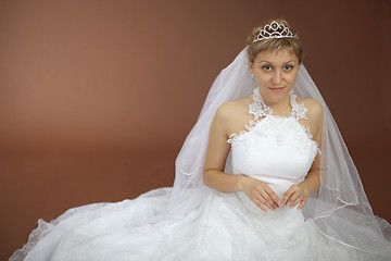 Image showing Beautiful amusing bride in white dress