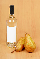 Image showing Bottle of white wine and pears