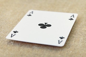 Image showing Ace of spades lies on table covered with fabric