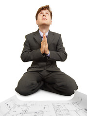 Image showing Engineering prays to Technology God on knees