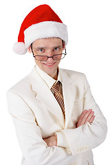 Image showing Smiling businessman in a Christmas hat