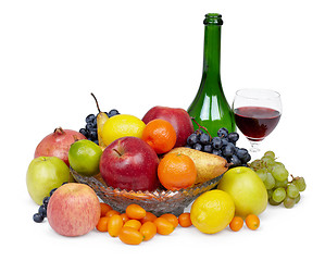 Image showing Large pile of fruit and red wine