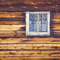 Image showing Wooden wall with square window