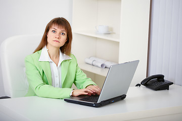 Image showing Women prevented from working on computer