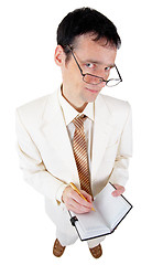 Image showing Funny young business man with a notebook