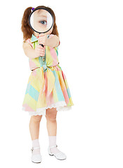 Image showing Comical child with magnifying glass in hands