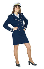 Image showing Beautiful woman in uniform of sea captain standing on white back