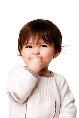 Image showing Cute mischievous baby toddler face