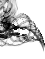 Image showing Abstract black smoke swirl on white