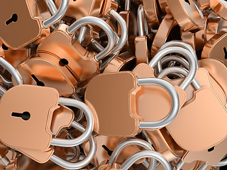 Image showing Close-up of locked brass padlocks