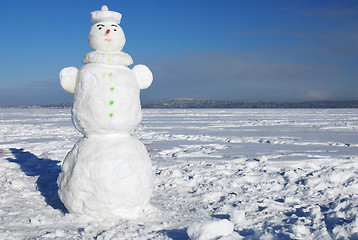 Image showing snowman on a wintry sunny day 