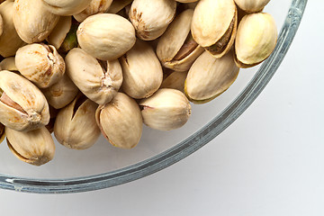 Image showing Pistachios nuts in glass bowl