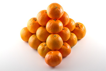 Image showing Clementines arranged in a pyramid shape