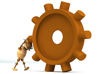 Image showing 3d wood man spinning a gearwheel