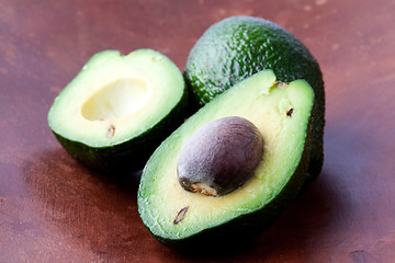 Image showing Avocados on a wooden background