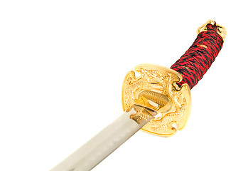 Image showing Closeup of golden katana sword 