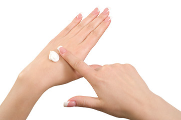Image showing Applying hand cream.