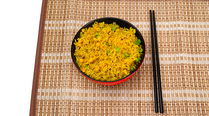 Image showing Bowl of rice and chopsticks