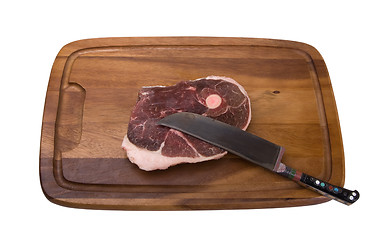 Image showing Raw meat on the wooden board