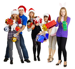 Image showing Group of young people with New Year's gifts