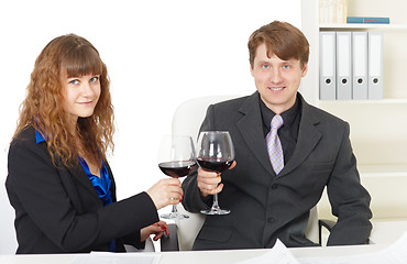 Image showing Clerks drink wine in office - celebrate