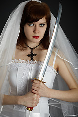 Image showing Young Bride armed sword