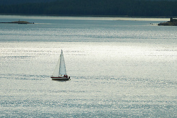 Image showing Small lonely yacht against sea