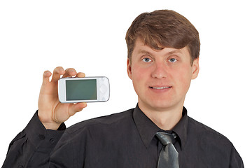 Image showing A guy shows new mobile phone