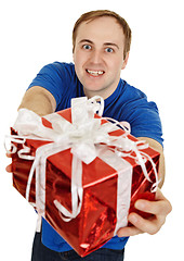 Image showing Funny man happily gives us a gift