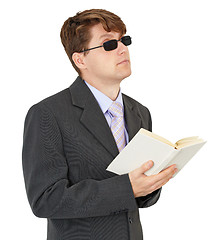 Image showing Blind young man with book isolated on white background