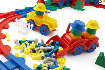 Image showing Toy bulldozer and railway on white background