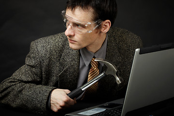 Image showing Person is going to break computer