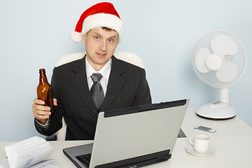 Image showing Businessman meets new year still working