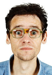 Image showing Amusing tousled man in old ridiculous spectacles