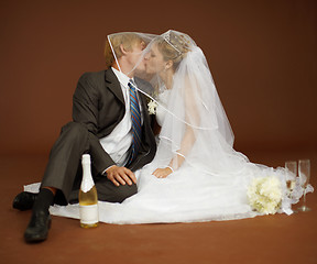 Image showing Bride and groom kissing