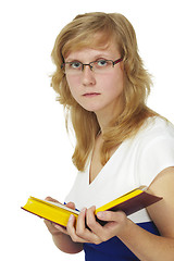 Image showing Woman wearing spectacles reads book