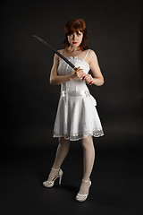 Image showing Beautiful girl armed with sword