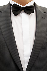 Image showing Breast of young man in tuxedo with bow tie