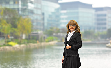 Image showing young business woman in business area