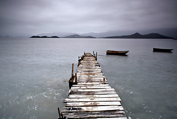 Image showing pier and boat, low saturation