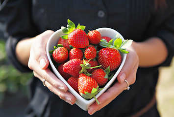 Image showing strawberries in heart shape bowl