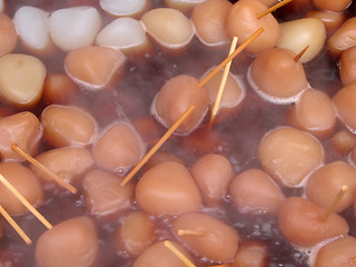 Image showing Rice balls boiling