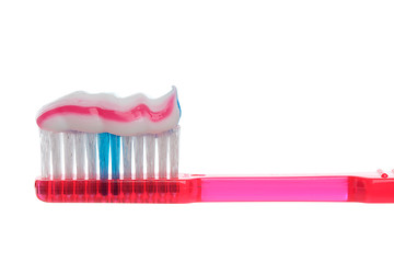 Image showing Toothbrush with striped toothpaste