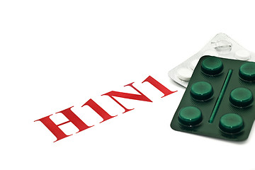 Image showing Swine FLU H1N1 - Closeup of green and white pills