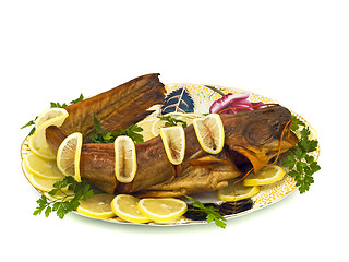 Image showing Tasty dinner - bloated fresh-water catfish on the plate